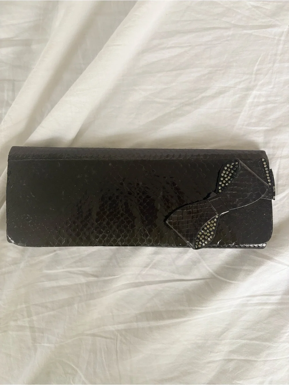 Black Bow-Accent Textured Clutch